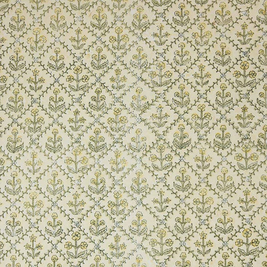a sheet of hand block printed wrapping paper with a floral lattice design in soft buttermilk yellow