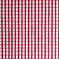 red and pink gingham pattern hand block printed on a white sheet of cotton paper
