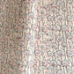 hand block printed wrapping paper by Paper Mirchi. Lotus flower repeat pattern in pale pink