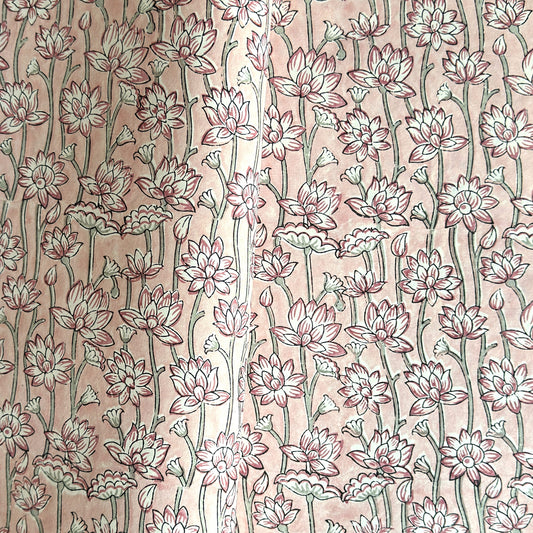 hand block printed wrapping paper by Paper Mirchi. Lotus flower repeat pattern in pale pink