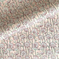 hand block printed wrapping paper by Paper Mirchi. Lotus flower repeat pattern in pale pink