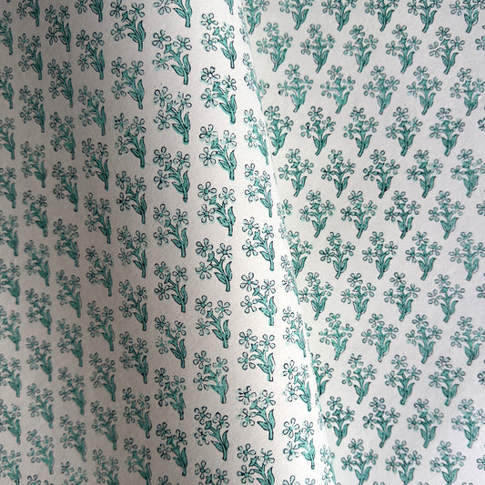 wrapping paper with repeat block print little floral pattern in aqua by Paper Mirchi