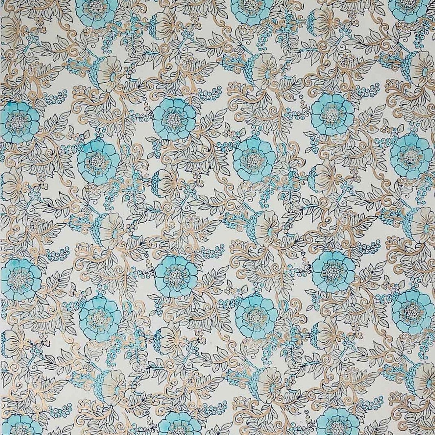 a sheet of hand block printed wrapping paper with a floral wild rose design in opal blue and gold