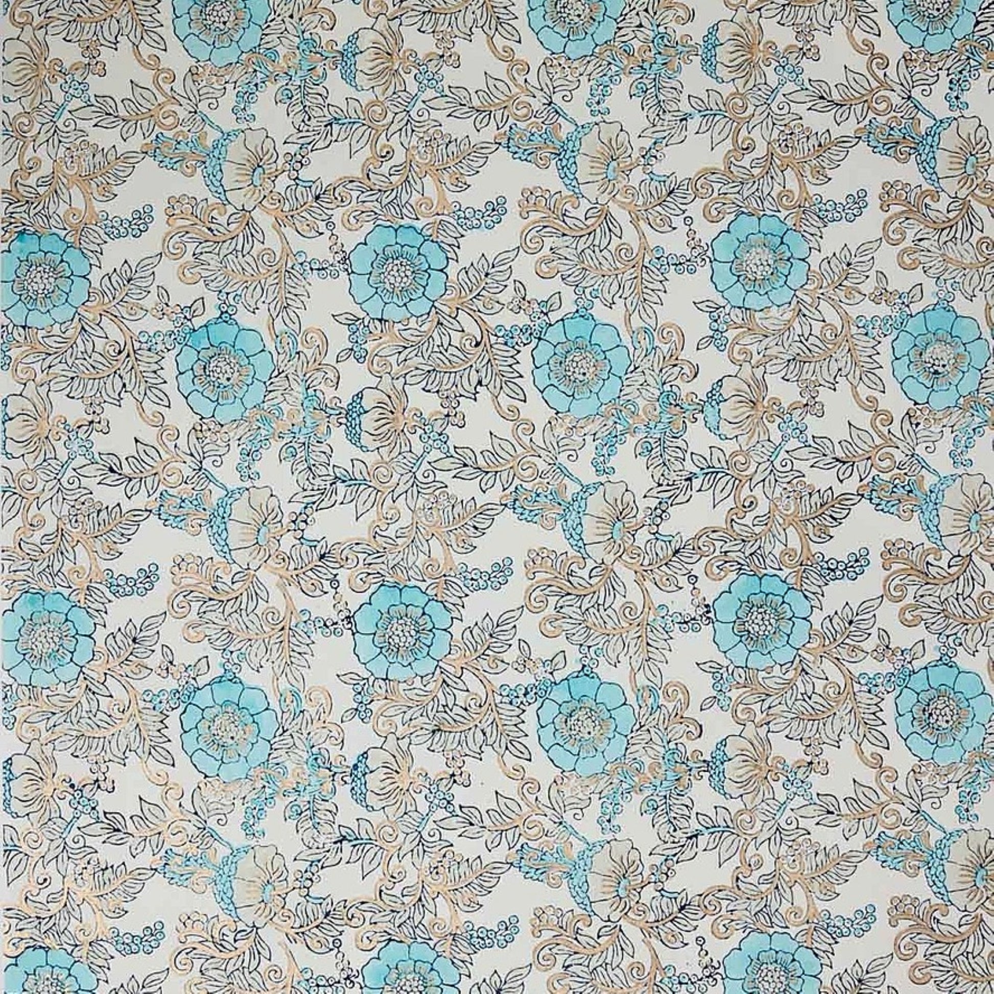 a sheet of hand block printed wrapping paper with a floral wild rose design in opal blue and gold