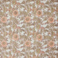 a hand block printed sheet of wrapping paper with a wild rose design in coral, moss green on a white background