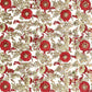 a sheet of hand block printed wrapping paper with a wild rose repeat design in scarlet red with soft green leaves and gold accents