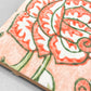 hand block printed greetings card with repeat floral pattern in coral and green, by Paper Mirchi