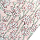 hand block printed wrapping paper by Paper Mirchi. Lotus flower repeat pattern in pale pink