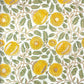 wrapping paper with repeat botanical pattern in yellow, gold and green by Paper Mirchi