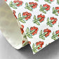 wrapping paper with repeat block print tulip bud pattern in coral and green by Paper Mirchi