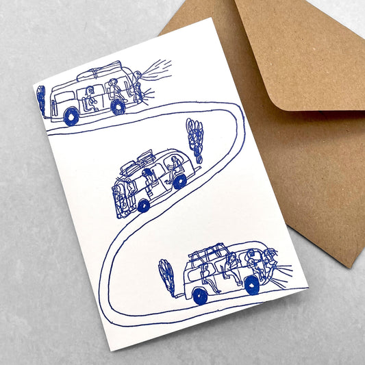 letterpress greetings card of a drawing of three camper vans on a winding road, blue ink on white by Passenger Press