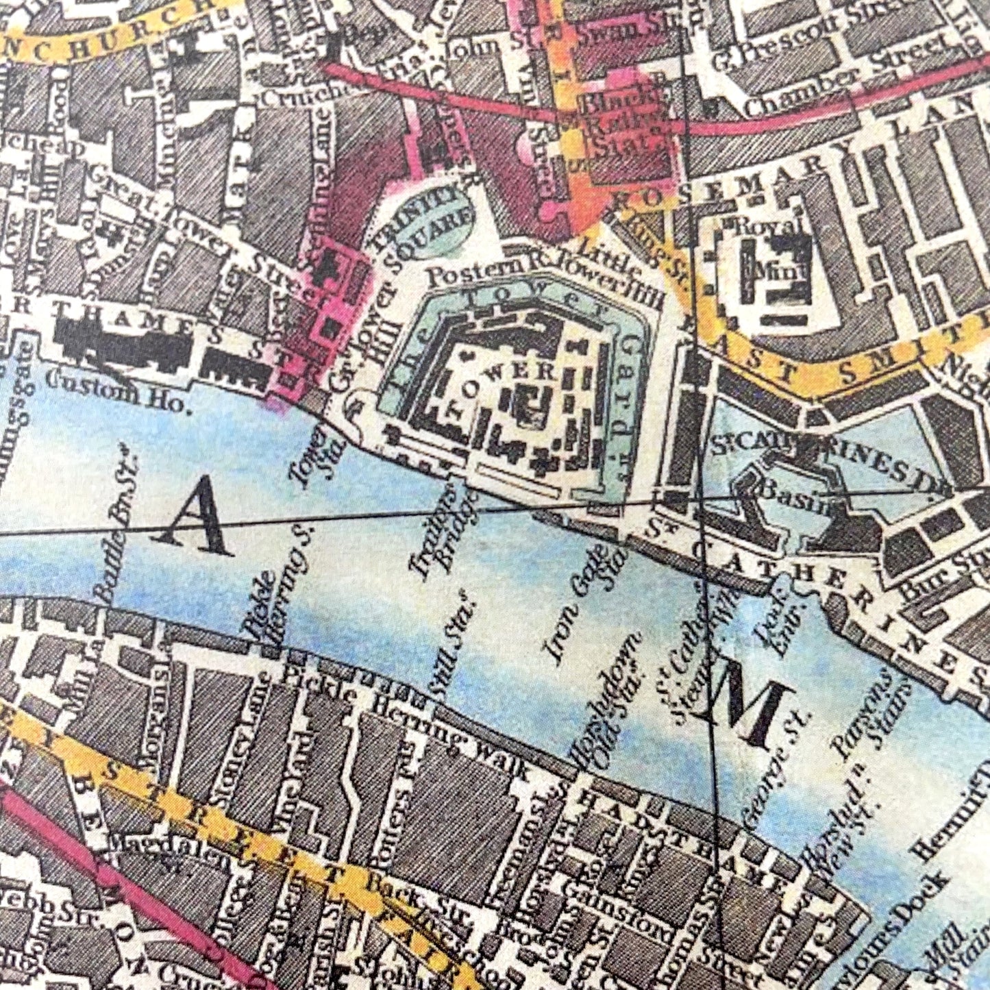 Wrapping paper with a vintage map of London (1848) by George Federick Cruchley. The map shows the proposed developments for London at this time and extends from Hyde Park in the west to the Docklands in the East, detail of The Tower of London