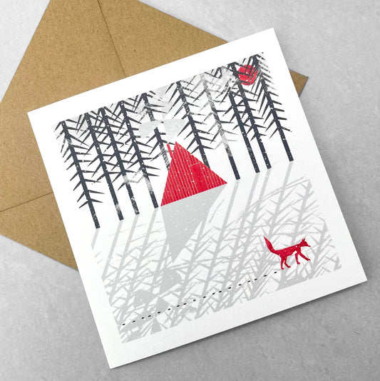 A pack of 4 cards with different designs inspired by snowfall, by Ruth Thorp Studio. A fox in the snow
