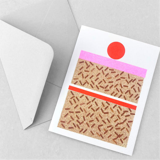 mini greetings card with image of a cake with pink icing and a cherry. By Scout Editions