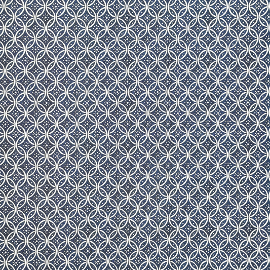 A sheet of Italian wrapping paper with a pattern of interlocking rings on a blue background.  