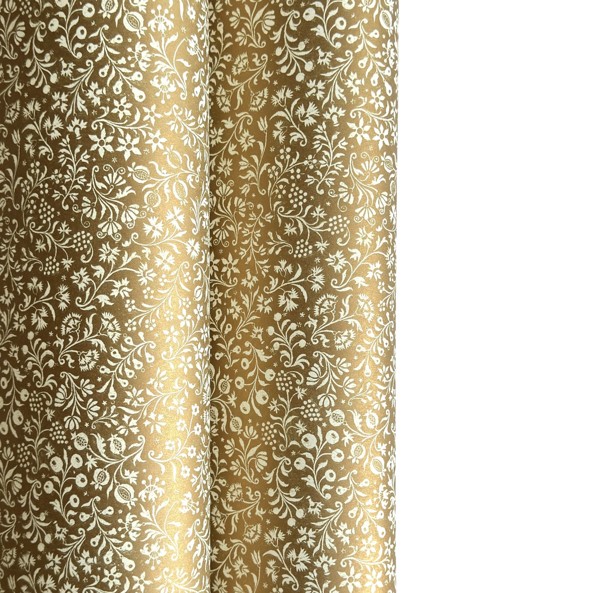 a sheet of Italian wrapping paper by Tassotti, the design is from the Remondini archives and is a small scale botanical block print on an antique gold ground