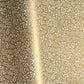 a sheet of Italian wrapping paper by Tassotti, the design is from the Remondini archives and is a small scale botanical block print on an antique gold ground