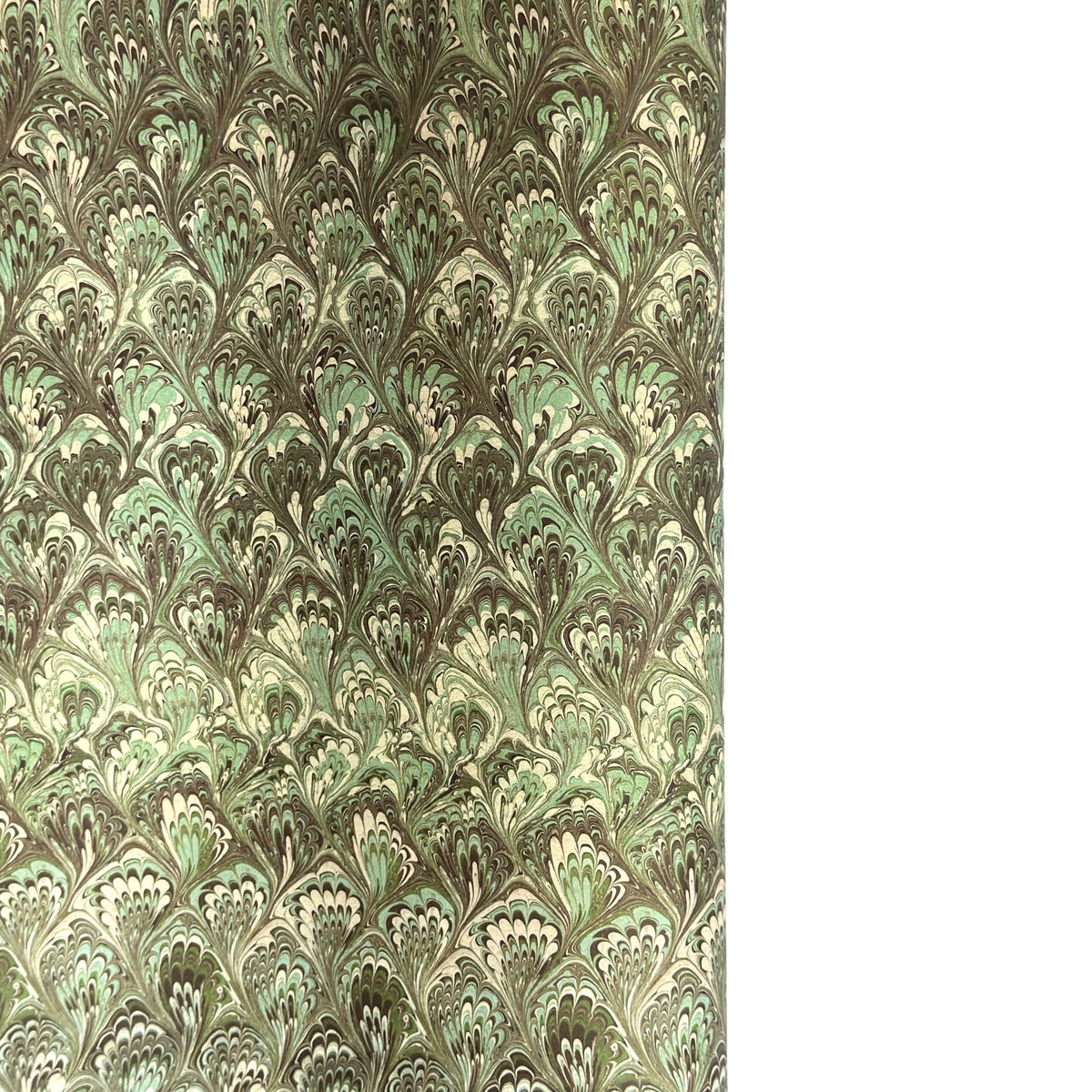 a sheet of Italian printed marbled paper by Tassotti with a marbled design in tones of green and cream