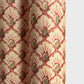 a sheet of italian wrapping paper with a shell repeat pattern in soft coral, cream and olive green