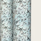 floral italian florentine wrapping paper with a white repeat floral on a mustard background