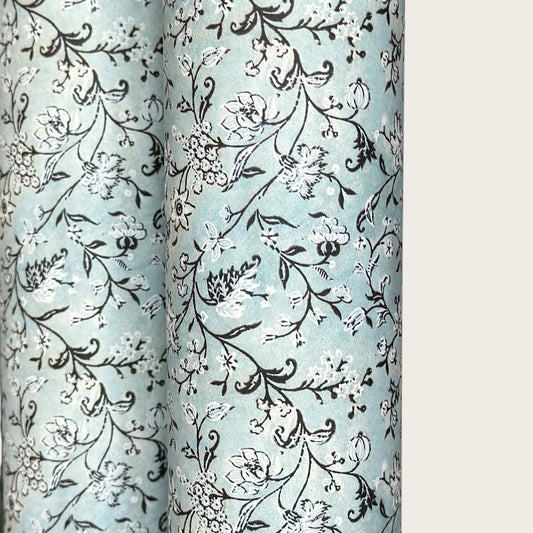 floral italian florentine wrapping paper with a white repeat floral on a mustard background