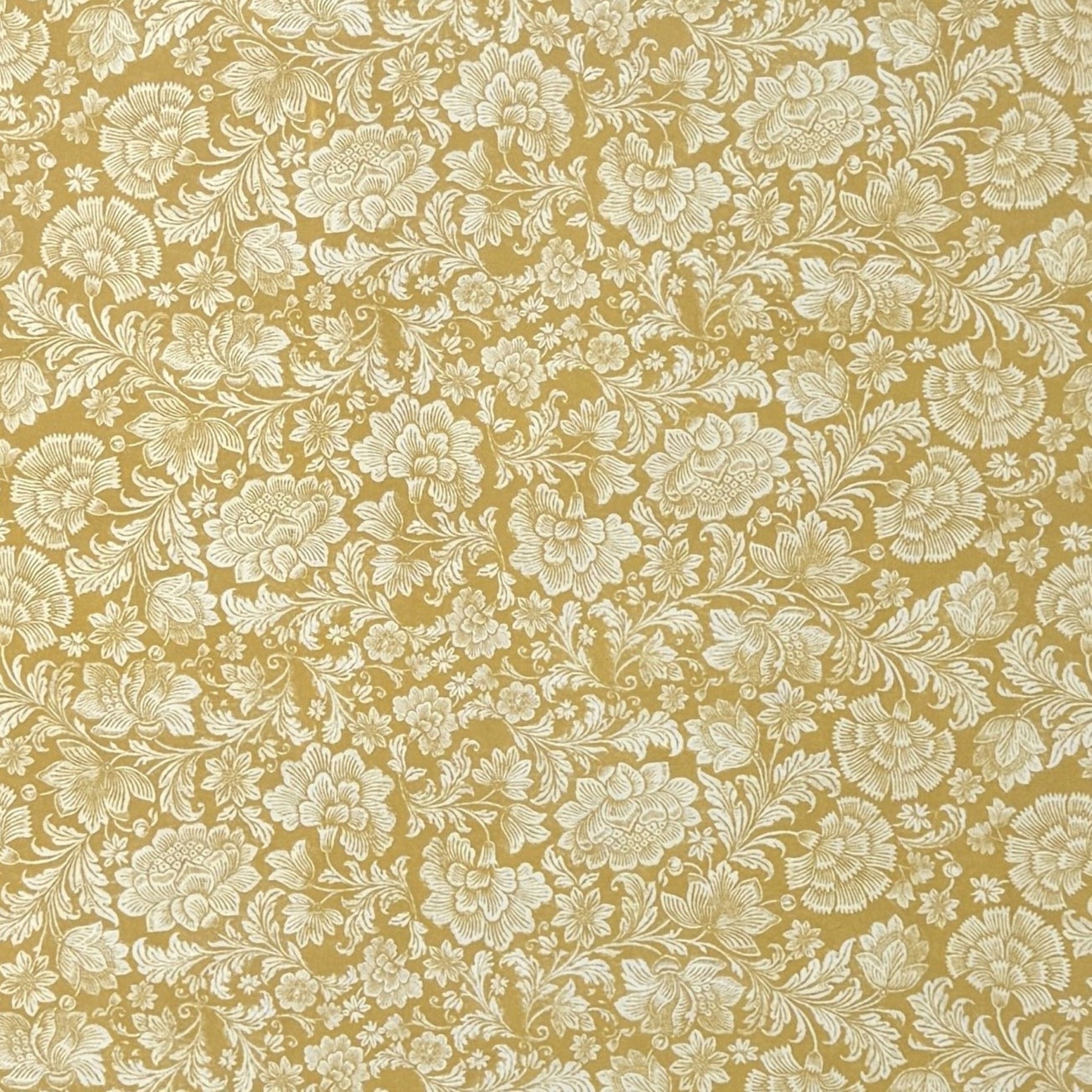 floral italian florentine wrapping paper with a white repeat floral on a mustard background