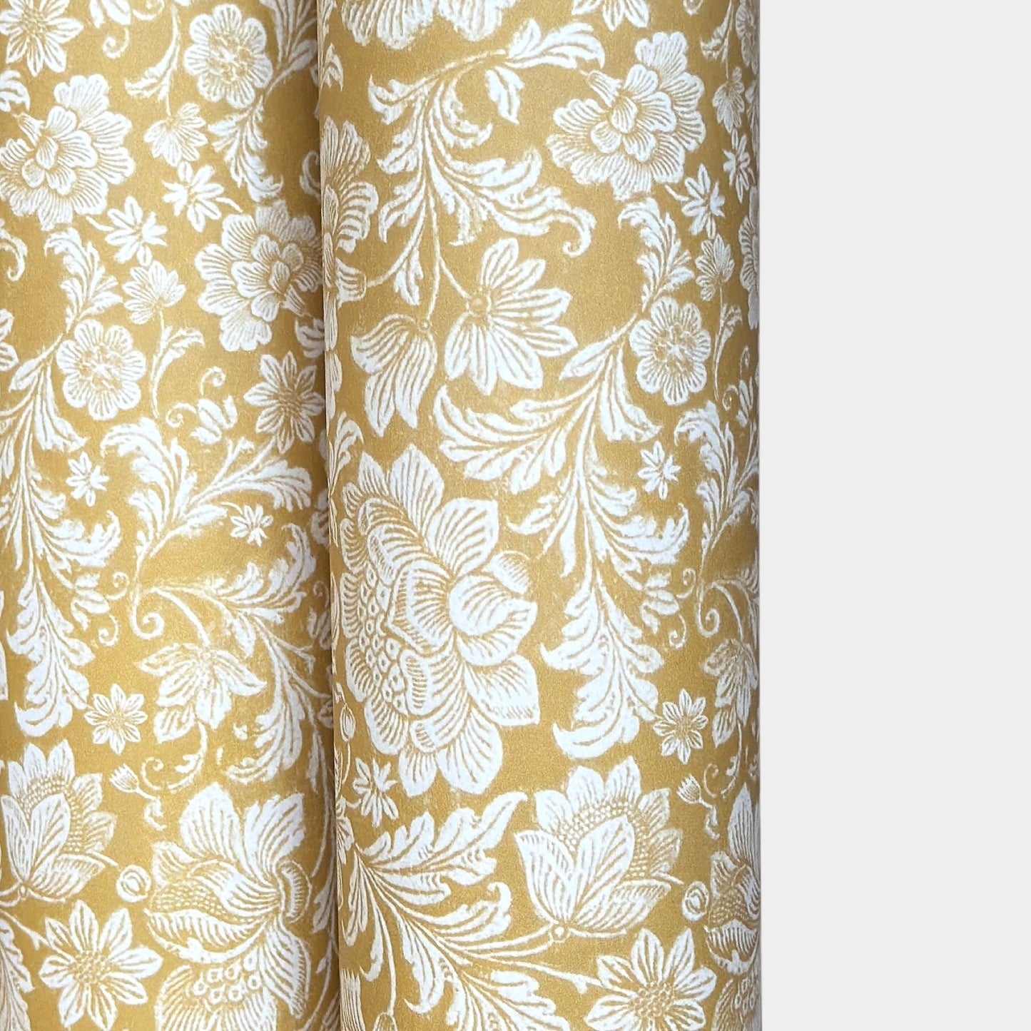 floral italian florentine wrapping paper with a white repeat floral on a mustard background