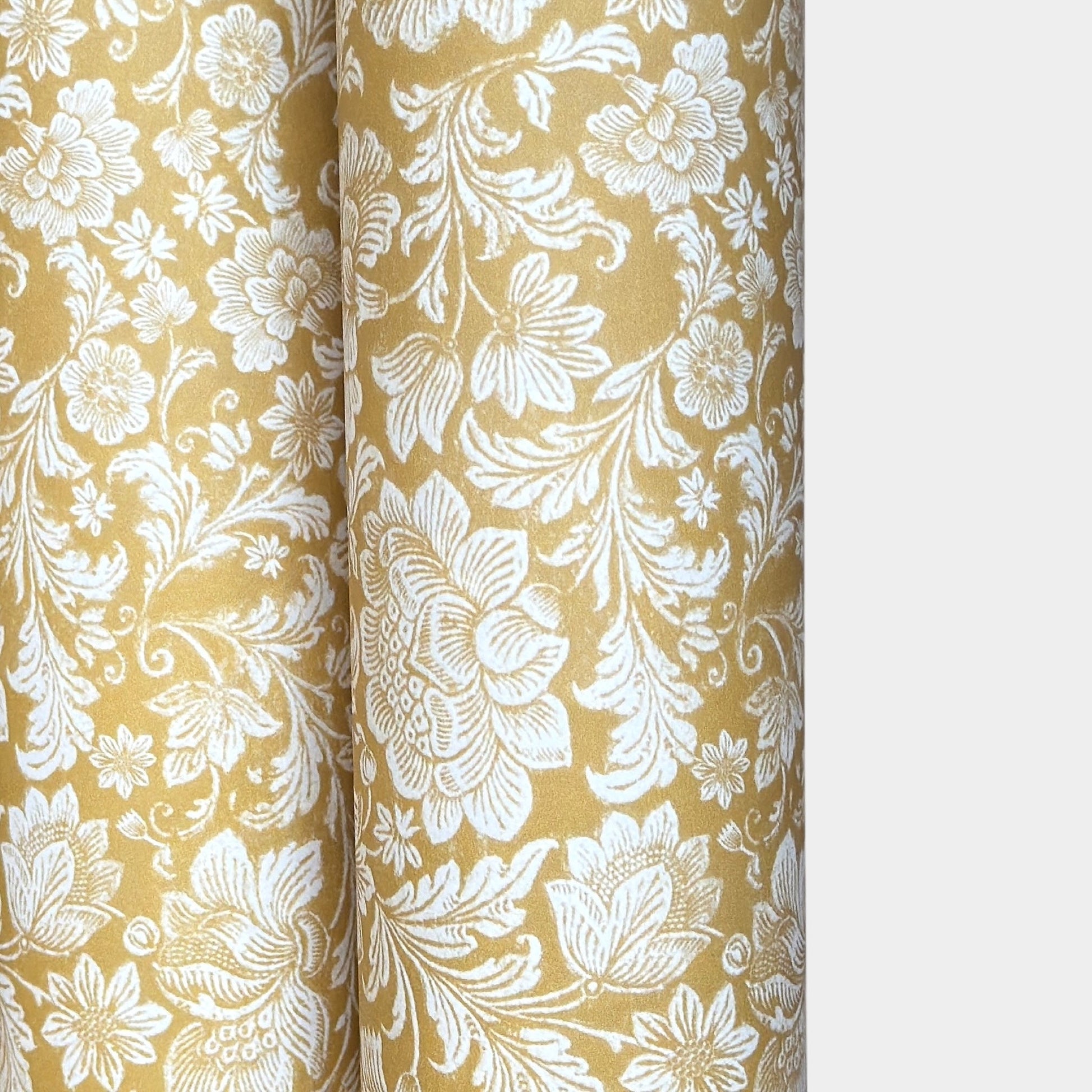 floral italian florentine wrapping paper with a white repeat floral on a mustard background