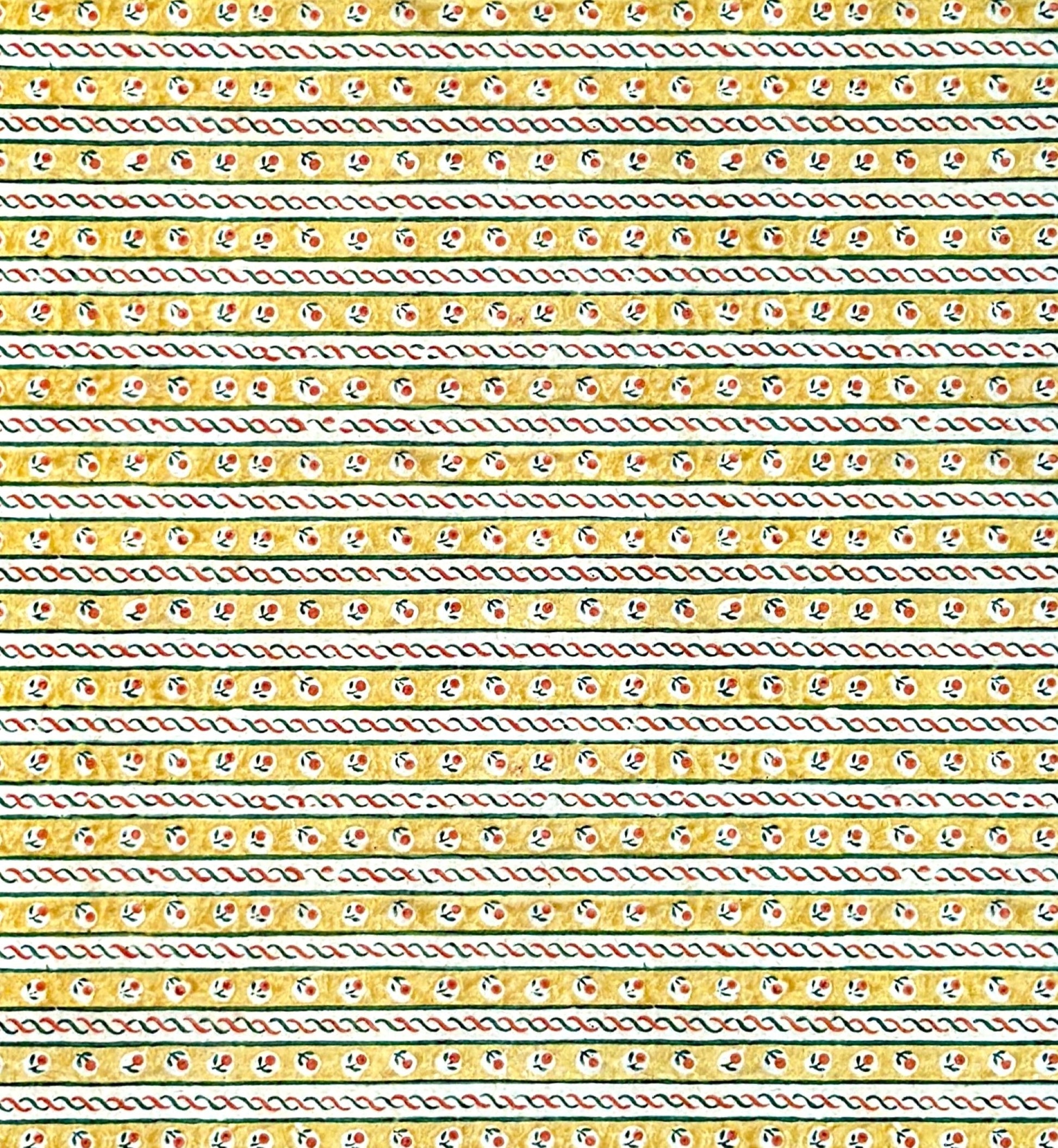 a sheet of florentine italian wrapping paper with a striped design in yellow, green, red and white with a little flower block print between the stripes
