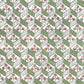 italian florentine wrapping paper with a geometric rombi design in green on white with a little block printed flower