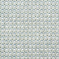 a patterned wrapping paper featuring a repeating botanical design with blue block printed steam puddings, green leafy wreaths, and small yellow accents on a white background.