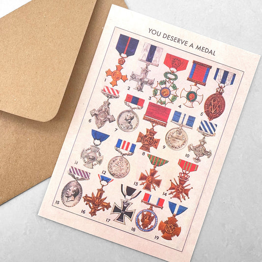 Greetings card by The Pattern Book. You Deserve A Medal card pictures 19 different medals. With Envelope