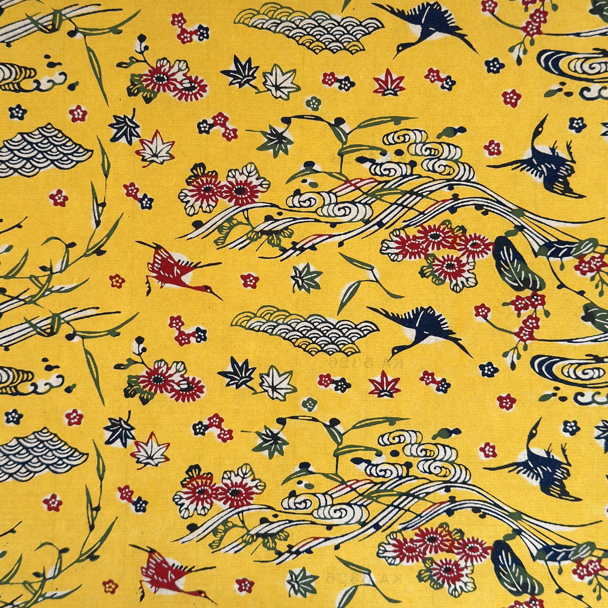 vintage katazome-shi stencil-dyed small papers from Japan. Yellow paper with Japanese cranes in red, blue and green. 