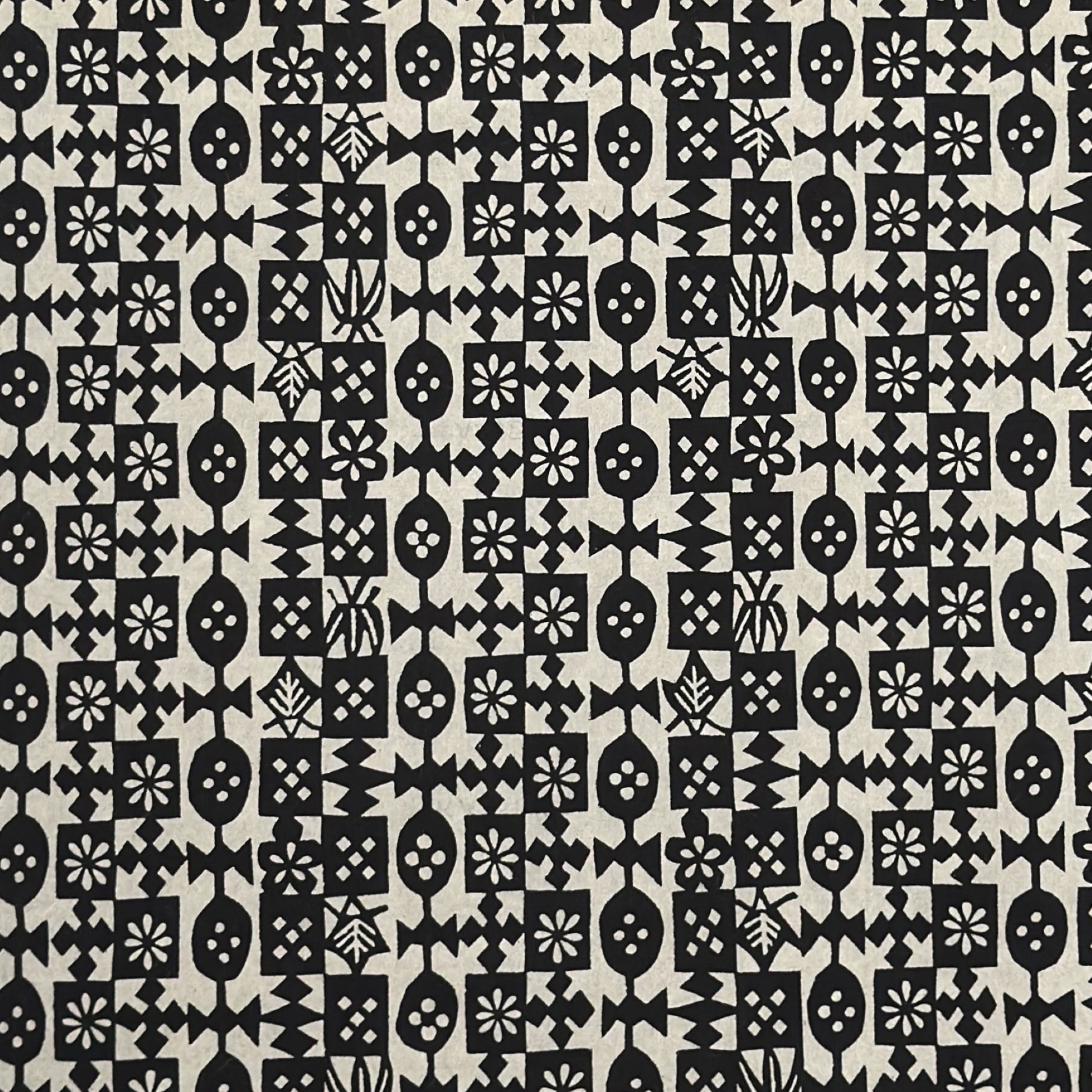 vintage katazome-shi stencil-dyed small papers from Japan. Cream paper with black geometric design. 