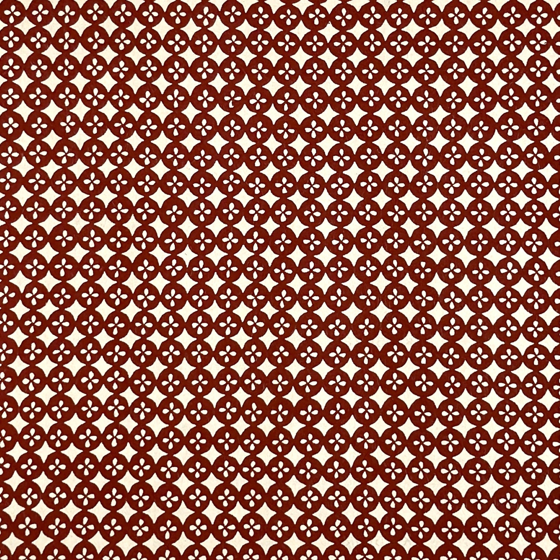 vintage katazome-shi stencil-dyed small papers from Japan. Cream paper with terracotta circles pattern. 