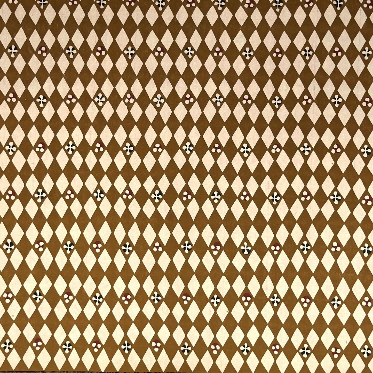 vintage katazome-shi stencil-dyed small papers from Japan. Cream paper with brown diamond pattern. 