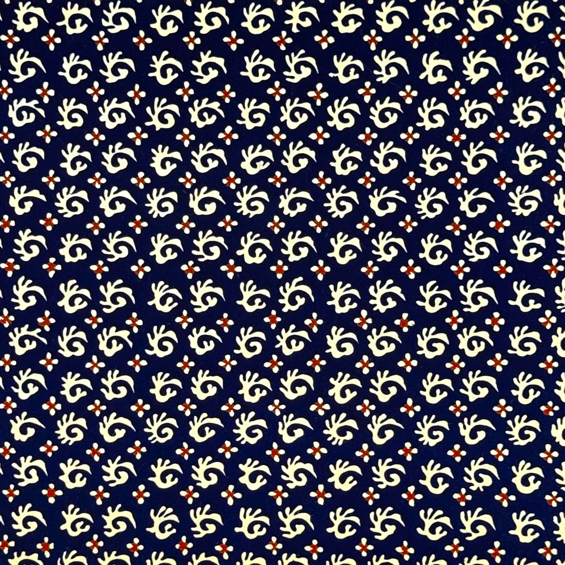 vintage katazome-shi stencil-dyed small papers from Japan. Navy paper with cream swirls. 