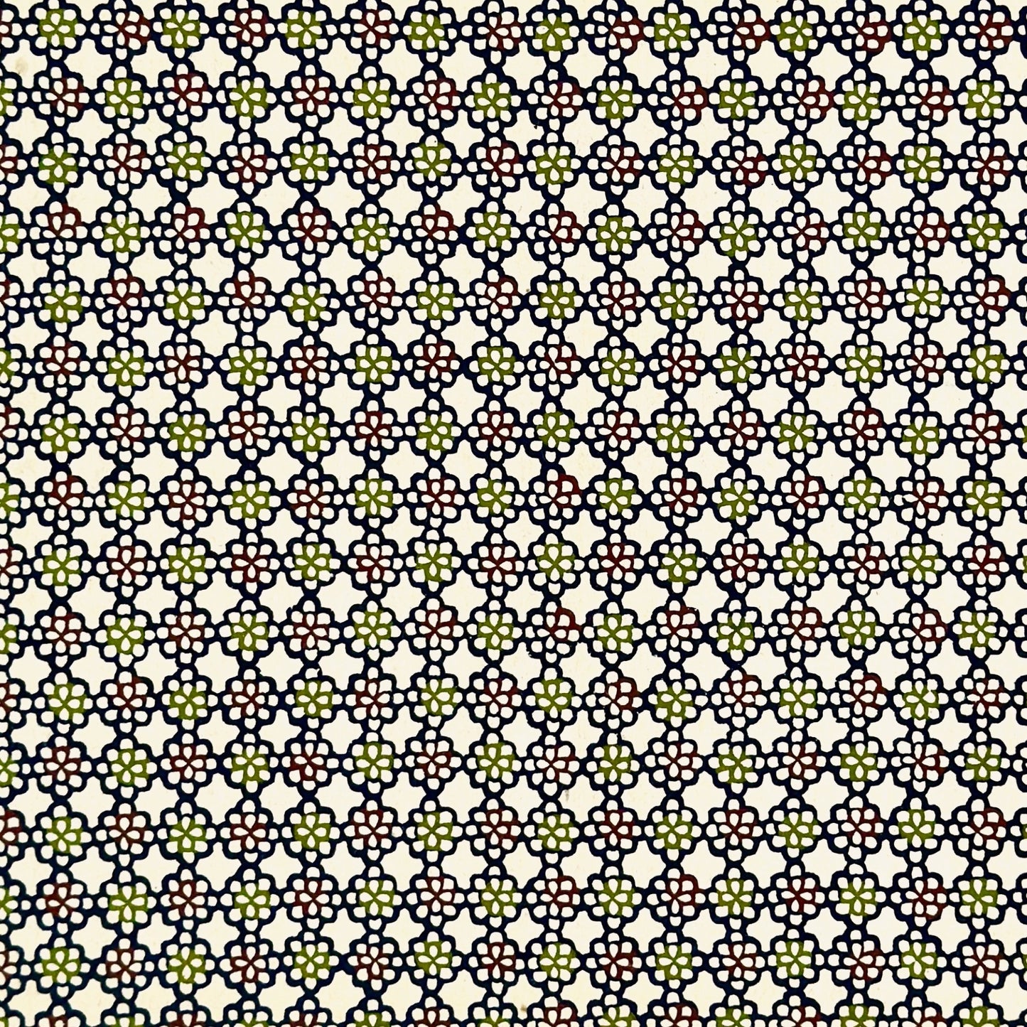 vintage katazome-shi stencil-dyed small papers from Japan. cream paper with a navy, red and green flower pattern. 