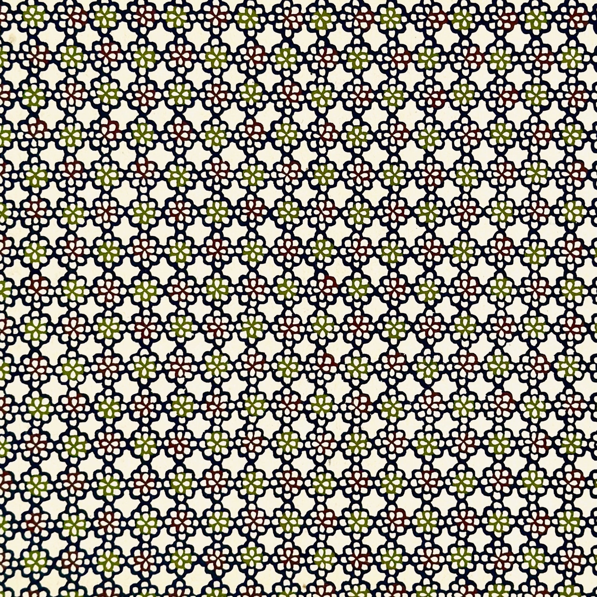 vintage katazome-shi stencil-dyed small papers from Japan. cream paper with a navy, red and green flower pattern. 
