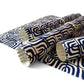 vintage katazome stencil dyed paper. cream paper with a navy wave pattern. Pictured rolled