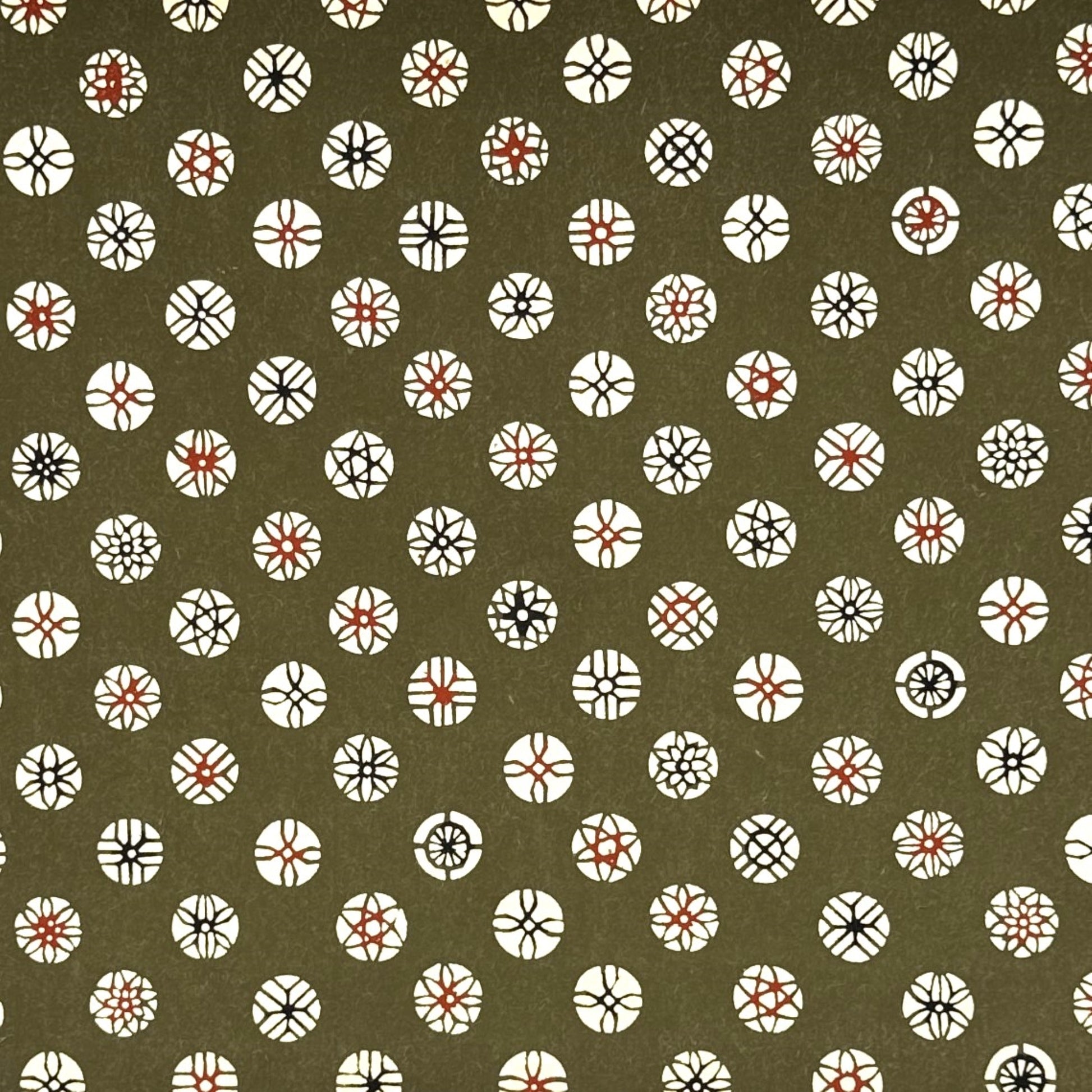 vintage katazome stencil dyed paper. Taupe paper with cream and red japanese circle motifs. 