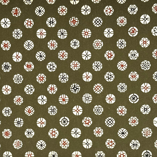 vintage katazome stencil dyed paper. Taupe paper with cream and red japanese circle motifs. 