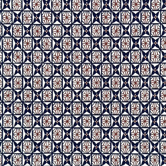 vintage katazome stencil dyed paper. Navy and red star pattern on cream paper. 