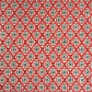 vintage katazome stencil dyed paper. Red and black star pattern on cream paper. 