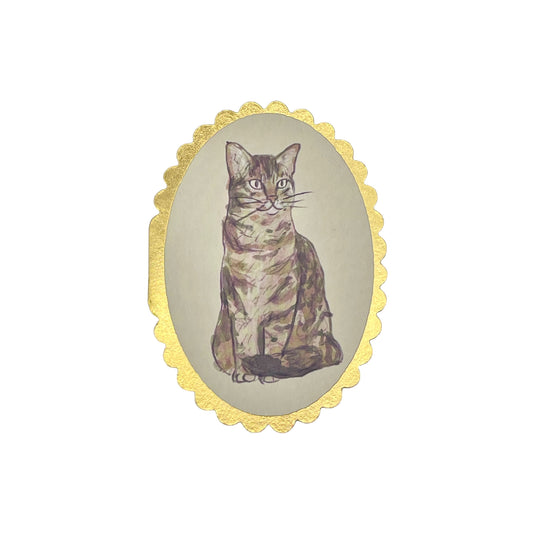 small oval greetings card with a drawing of a tabby cat.  the card has a gold foiled scalloped edge. By Wanderlust