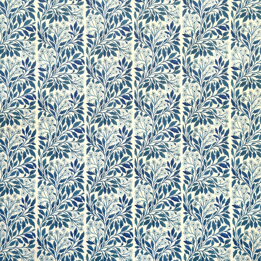 patterned paper / gift wrap with a delicate floral repeat pattern in blue on a ivory background.  By Wanderlust