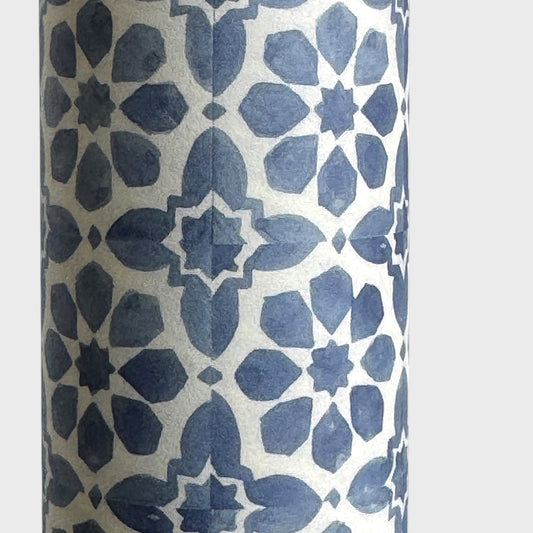 patterned paper / gift wrap with a blue and white tile design. By Wanderlust