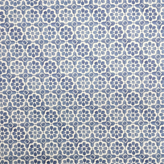 patterned paper / gift wrap with a blue and white tile design. By Wanderlust