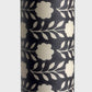floral patterned wrapping paper in brown and cream. Close up