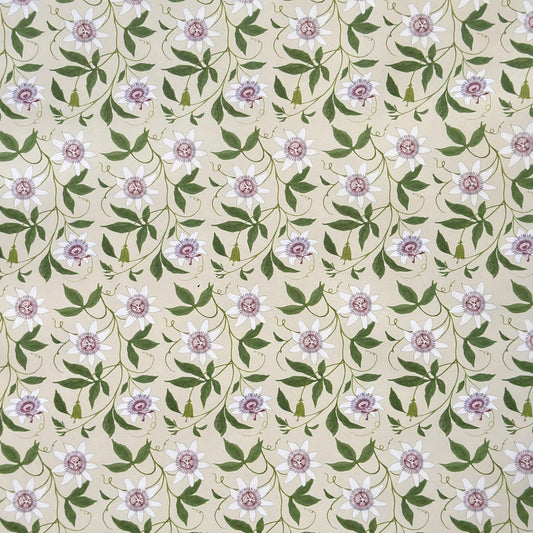 floral wrapping paper with pink passion flowers, green leaves on a cream background  